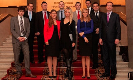 Members of the Conservative Friends of Russia pose on the staircase of Russia's Duma. Richard Royal, the group's executive committee chairman, is back row far right. 