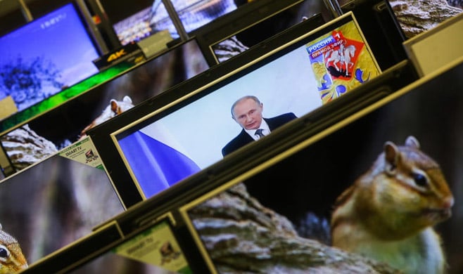 Maxim Stulov / Vedomosti Most of the Russians living abroad rely on Kremlin-backed media for news from home.