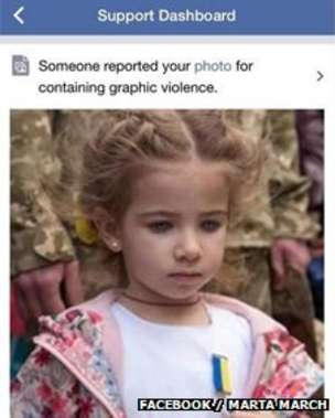 This girl's father was apparently killed fighting Russia-backed separatists in Ukraine. The image was removed after it was reported for containing graphic violence 