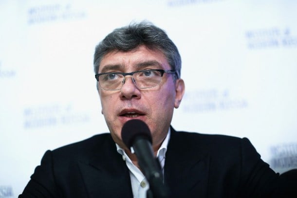 Slain Russian opposition leader and former Deputy Prime Minister Boris Nemtsov speaks during a news conference on "Corruption and Abuse in Sochi Olympics" Jan. 30, 2014 in Washington, DC. Before his murder near the Kremlin on Feb. 27, he was investigating Russia's war against Ukraine. His supporters and colleagues finished the work for him, releasing a 65-page report on May 12. © AFP 