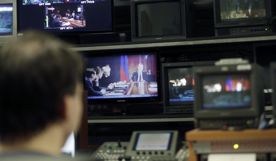  A Pervy Baltiysky Kanal technician supervises the broadcast of Russian TV content in Riga, Latvia, on January 26, 2015. Ints Kalnins/Reuters 