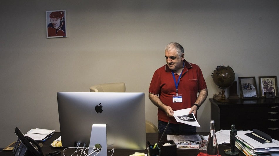  Aram Gabrelyanov, the head of News Media group, which includes LifeNews, looks over his desk inside his Moscow office, June 5, 2015. Image: Evgeny Feldman, Mashable