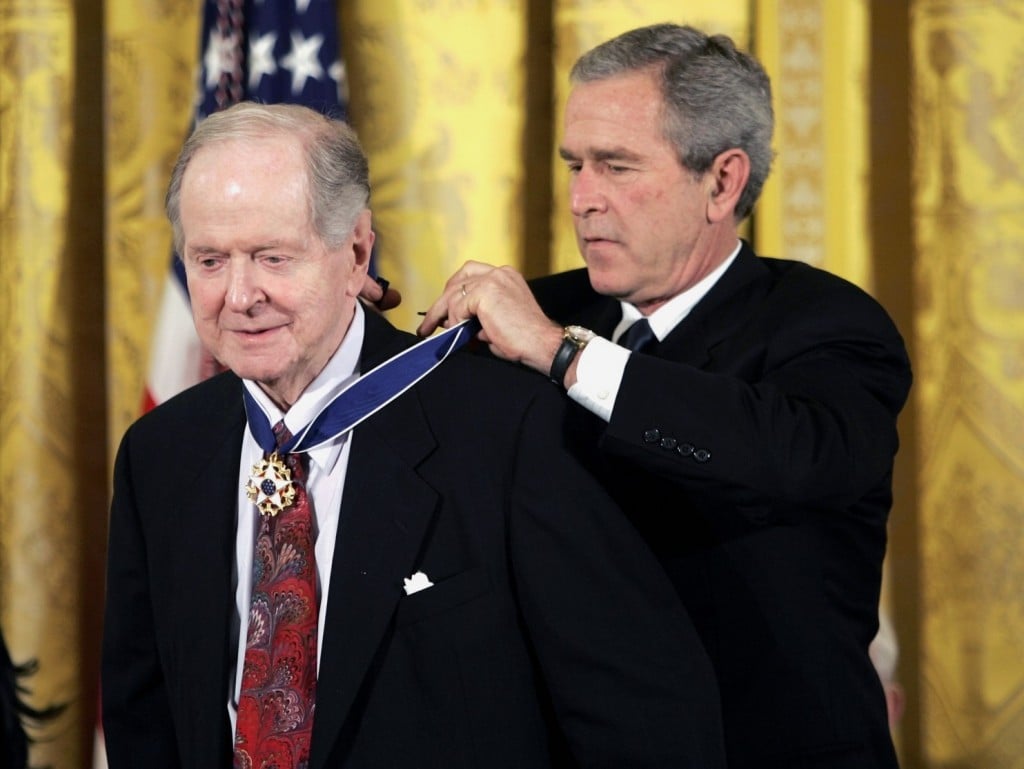 President George W. Bush presents the Presidential Medal of Freedom to historian Robert Conquest, left, in 2005. (Evan Vucci/Associated Press)