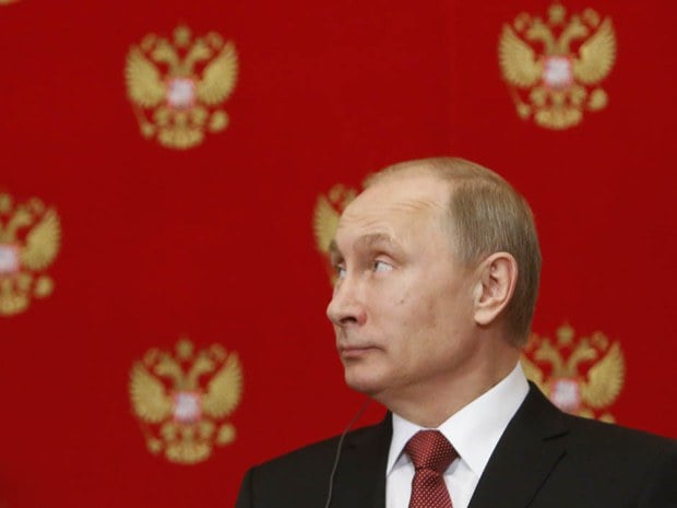 Russian President Vladimir Putin attends a joint press conference with Italian Prime Minister Matteo Renzi following their meeting at the Kremlin in Moscow on March 5, 2015. AFP PHOTO / POOL / SERGEI KARPUKHINSERGEI KARPUKHIN/AFP/Getty Images