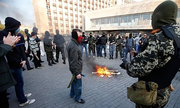 Pro-Russian protesters in the Ukrainian city of Donetsk. Photograph: Marko Djurica/Reuters 