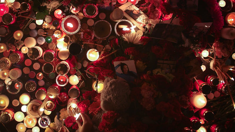 People lit candles and left flowers at Dvortsovaya Square in St. Petersburg on Sunday, November 1 during a day of national mourning for victims of a Metrojet crash over Egypt that killed all 224 on board. Photo by Nikolai Gontar for Demotix