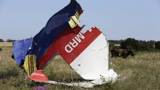  Image copyright Getty Images. Image caption Wreckage from MH17 