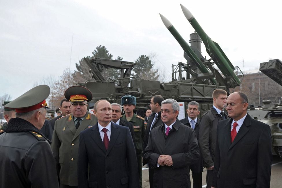 President Putin standing in front of a Buk missile launcher in 2013 
