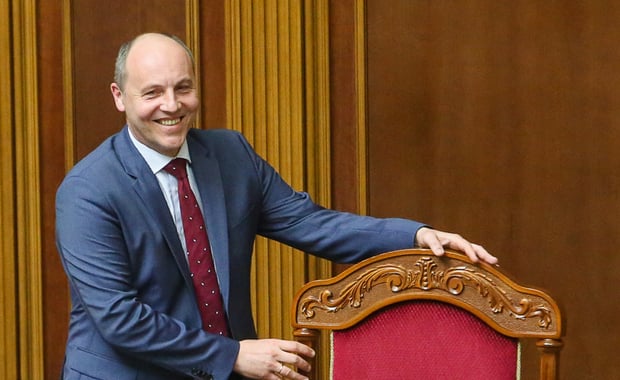  Andriy Parubiy, newly appointment chair of the Ukrainian parliament, smiles during a parliamentary session in Kyiv on April 14. Photo by Volodymyr Petrov 