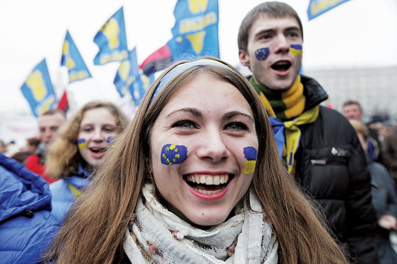 Face-painted patriots march from Shevchenko Park to European Square on Nov. 24, 2013. (Kostyantyn Chernichkin)