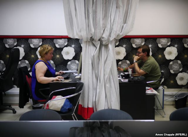 Journalists at work in the Yakutsk Vecherny offices, some 4,900 kilometers northeast of Moscow