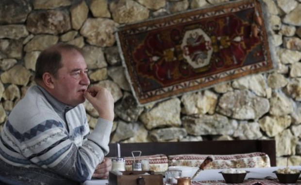 A picture taken on February 12, 2015 shows Mejlis member Ilmi Umerov, former head of the Bakhchysaray's district, looking on during an interview with AFP in Bakhchysaray. (AFP) Photo by AFP