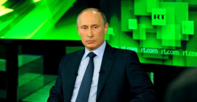 Vladimir Putin giving an interview to Russian propaganda TV channel “RT,” formerly known as “Russia Today” (image: screen capture)